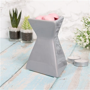 Triangle wax warmer
