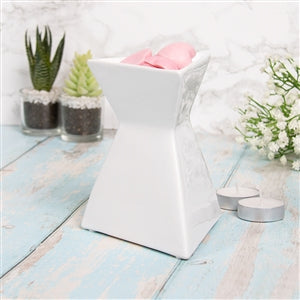 Triangle wax warmer
